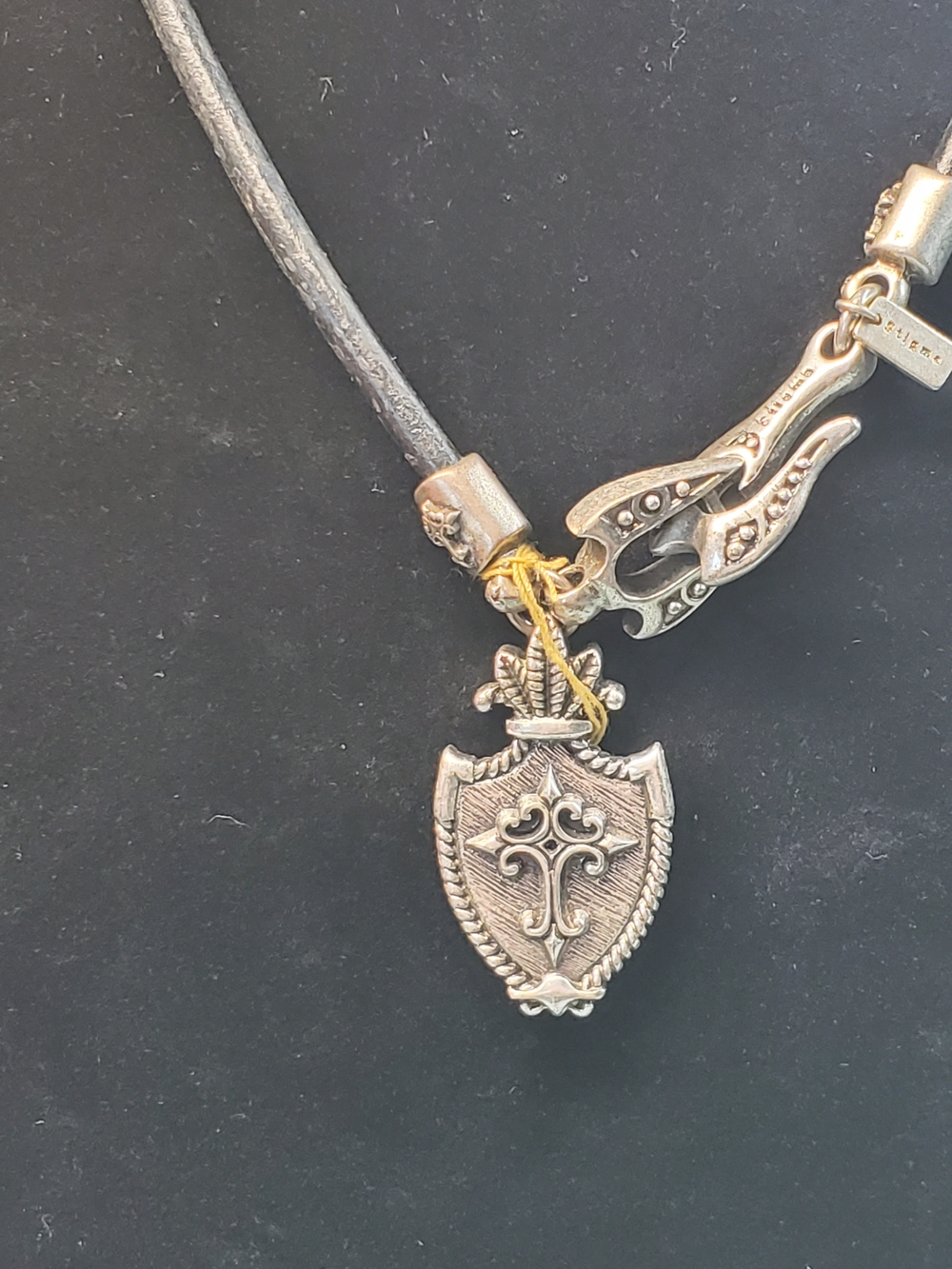 Ornate Shield Pendant Necklace in Silver Tone on Black Cord